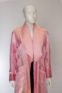 A Vintage 1950s Pink Robe with Quilted Collar and Pockets