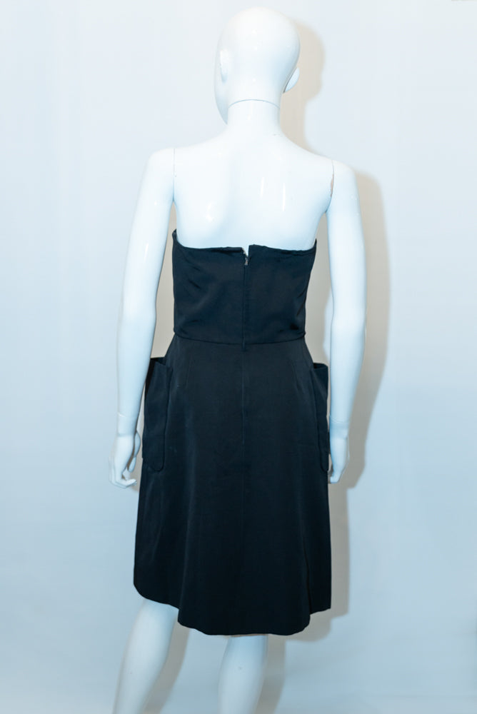 Black strapless dress with 2024 pockets