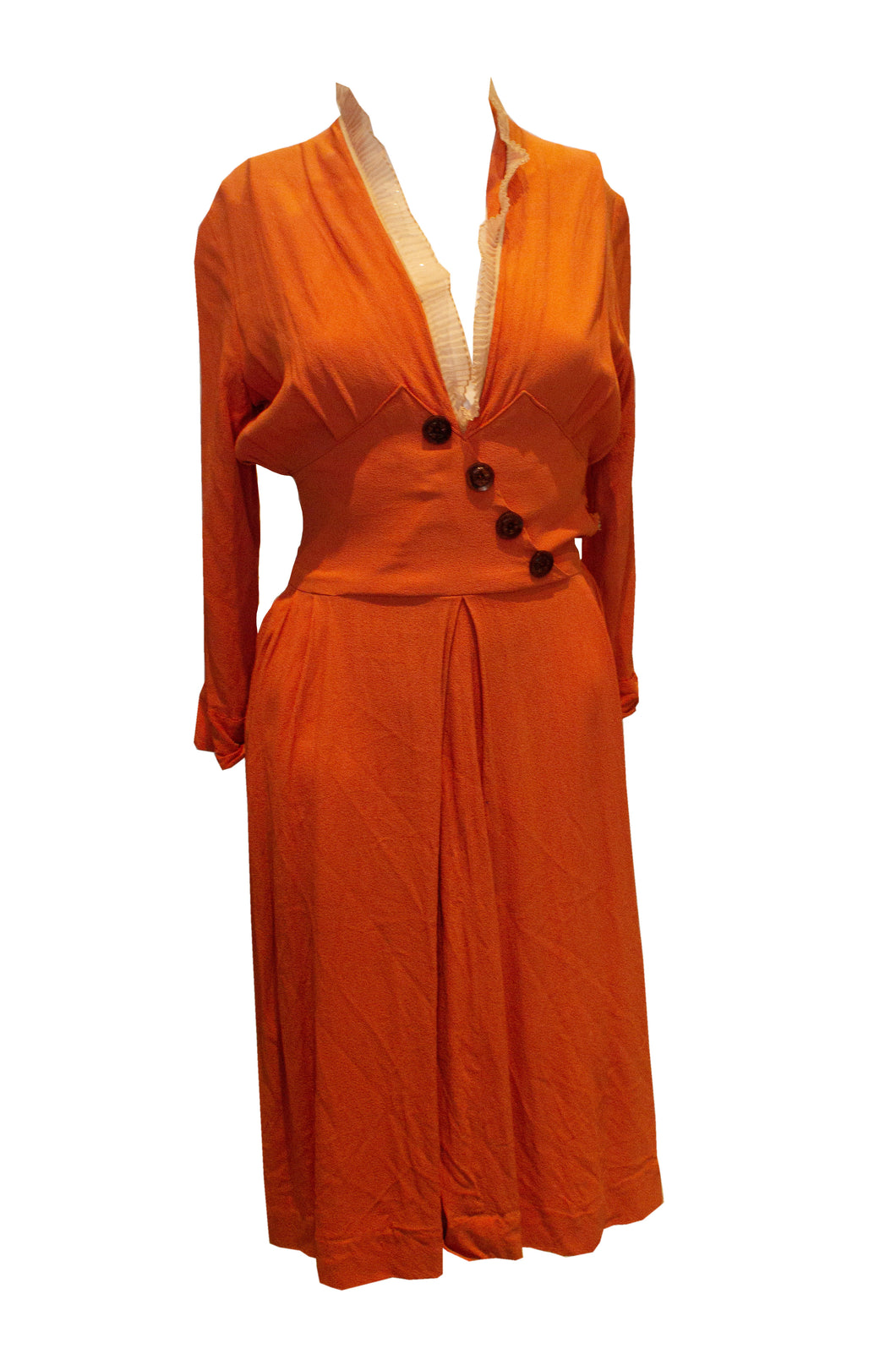 A vintage 1920s / 1930s orange crepe day dress