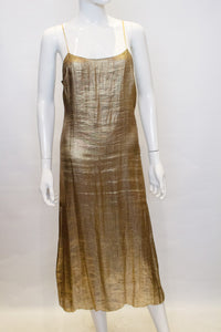 A vintage 1920s Gold Lame and Lace flapper Evening Dress