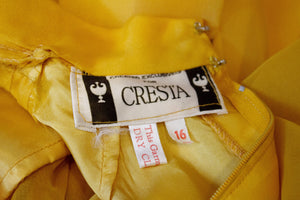 A Vintage 1960s Cresta Mustard Colour Gown