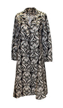 Load image into Gallery viewer, A vintage 1960s black and white graphic print duster coat