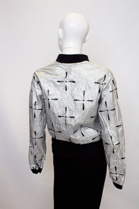 A Vintage 1980s silver ICA Paper Jacket