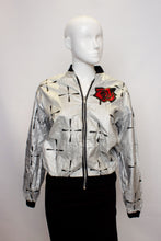 Load image into Gallery viewer, A Vintage 1980s silver ICA Paper Jacket