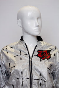 A Vintage 1980s silver ICA Paper Jacket