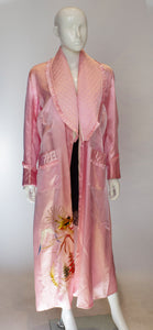 A Vintage 1950s Pink Robe with Quilted Collar and Pockets
