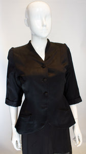 A Vintage 1940s Black Satin short sleeved Jacket