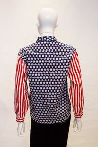 A vintage moschino red white and blue star print shirt