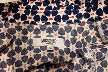Load image into Gallery viewer, A vintage moschino red white and blue star print shirt