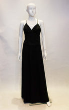 Load image into Gallery viewer, A vintage 1970s black Chic Evening Skirt and Top