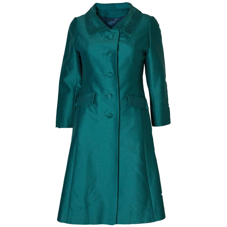 A Vintage 1960s Teal Coloured dress coat /evening jacket