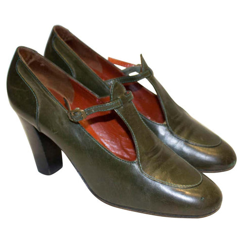 A pair of Vintage Yves Saint Laurent Paris Olive Green Leather Shoes