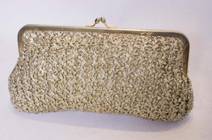 A Vintage 1970s Gold Raffia clutch evening Bag