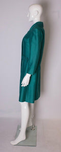 A Vintage 1960s Teal Coloured dress coat /evening jacket