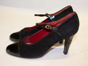 A pair of Vintage Yves Saint Laurent Paris Shoes in Black Patent and Suede