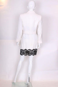 A vintage 1990s white with black lace trim Yves Saint Laurent Skirt Suit